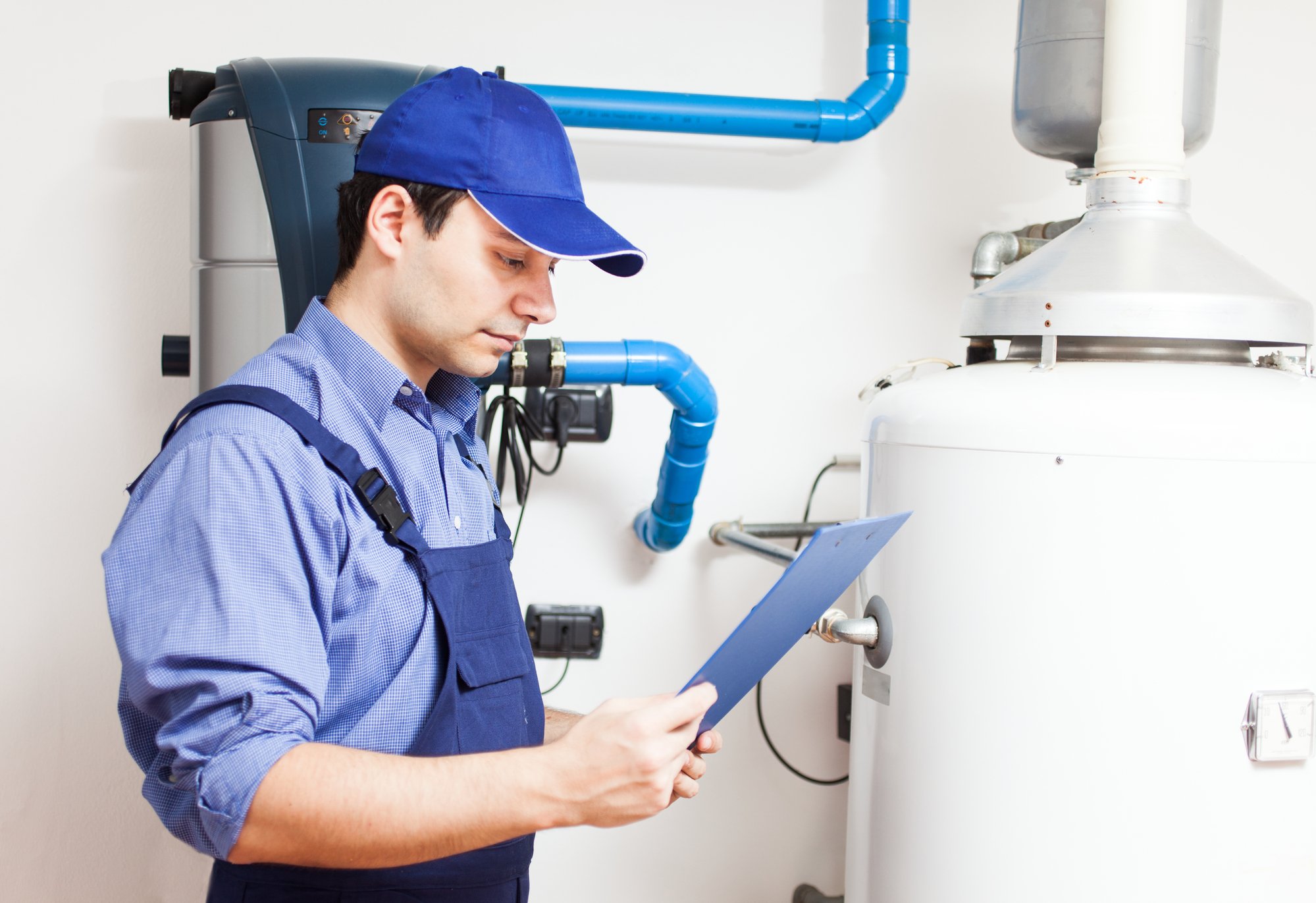 technician with a hot water heater